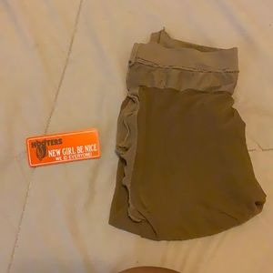 New or used pantie hose , and a name tag